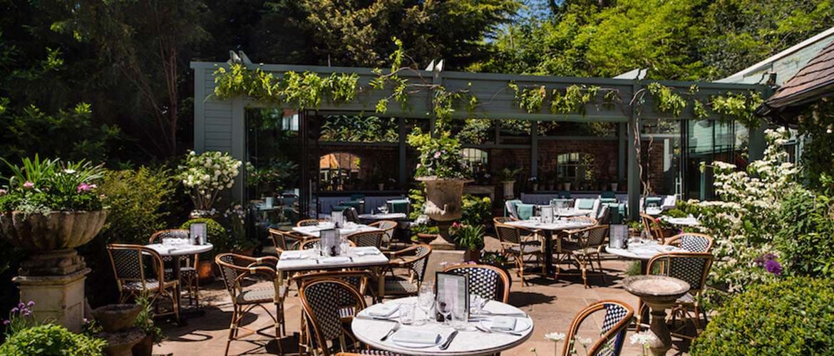 The Ivy Cobham Garden, outdoor seating area