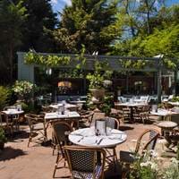 The Ivy Cobham Garden, outdoor seating area