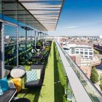 Outdoor seating at Sky Lounge with a view over Leeds