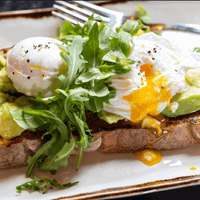 Avocado and poached eggs on toast at The Riverside