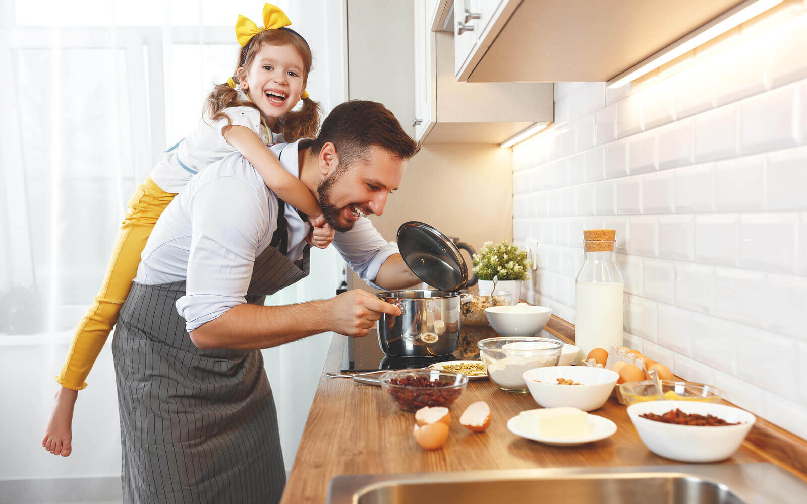 Baking a Cake with Family in the Kitchen, Father and Daughter